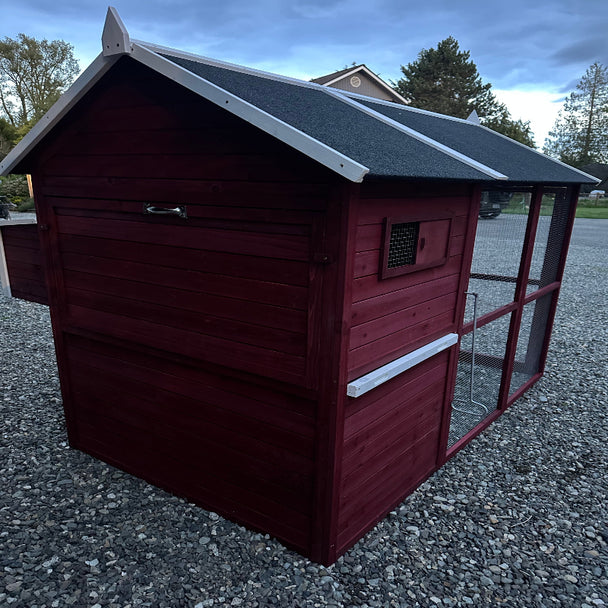 New Urban Northern farmhouse coops wooden chicken coop with a dark barn red exterior, black and gray roof