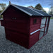 New Urban Northern farmhouse coops wooden chicken coop with a dark barn red exterior, black and gray roof