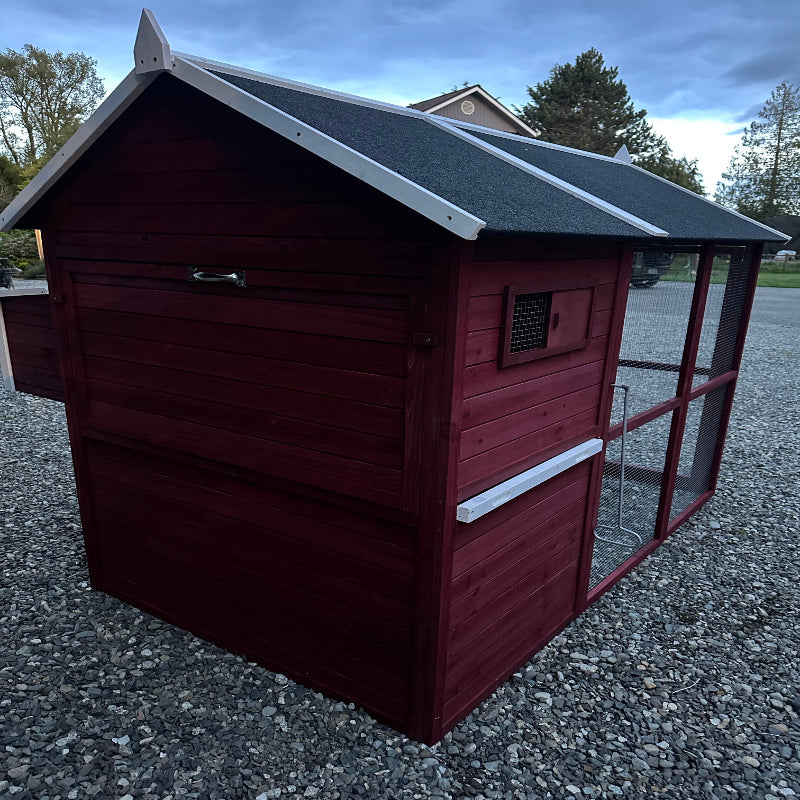 New Urban Northern farmhouse coops wooden chicken coop with a dark barn red exterior, black and gray roof