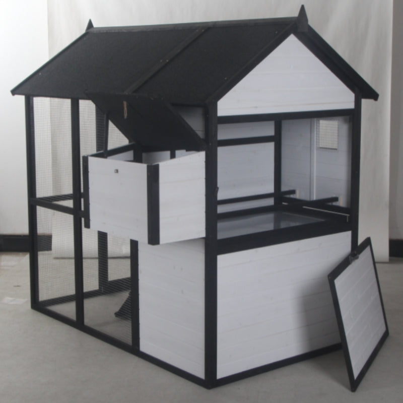 New Urban Northern Coops farmhouse coops wooden chicken coop with a white exterior, black trim and black roof