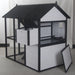 New Urban Northern Coops farmhouse coops wooden chicken coop with a white exterior, black trim and black roof